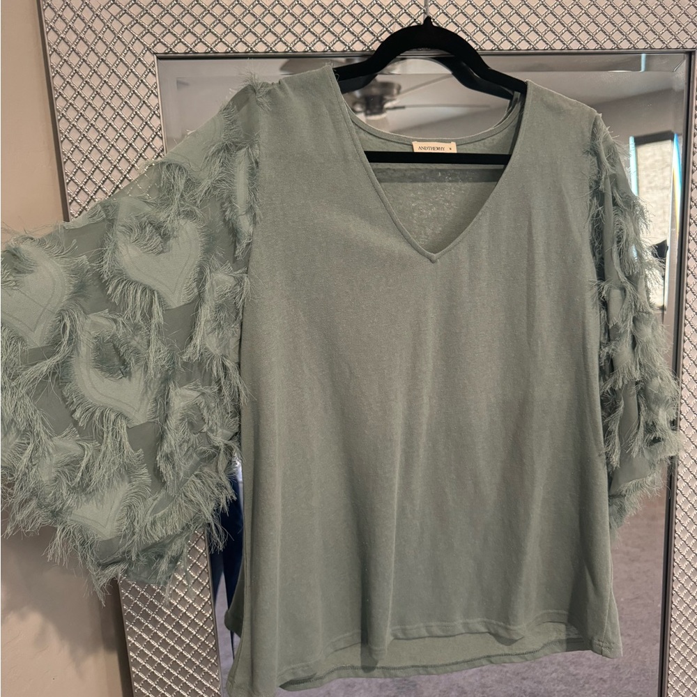 Elegant Green Top with Textured Sleeves